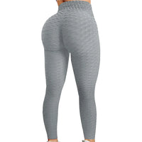 Legging Push Up Sport Gris poue le sport du quotidien. Tissu doux et intelligent pour un effet push up.